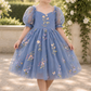 dusty blue floral embroidered flora flower girl dress in tulle with big puffy sleeves and knee length style dress. 