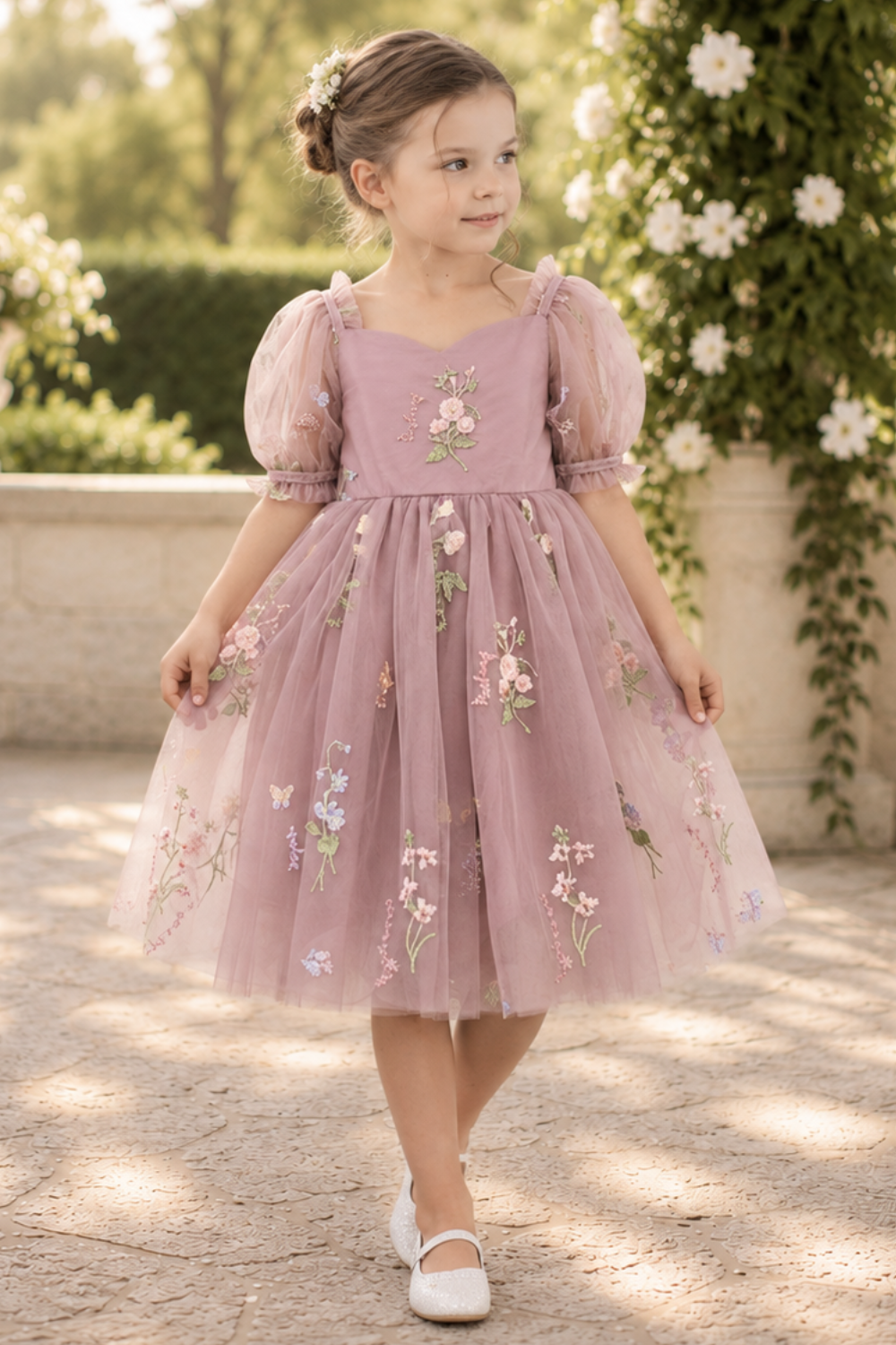 floral flower girl dress in embroidered floral ivory tulle and big puffy sleeves.  
