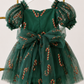 Girls green Christmas dress with sparkling red and gold candy cane accents, sweetheart neckline and full green tulle skirt.