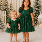 Matching sisters Christmas dress for girls featuring green tulle, red and gold candy cane details, sweetheart neckline and short puff sleeves.