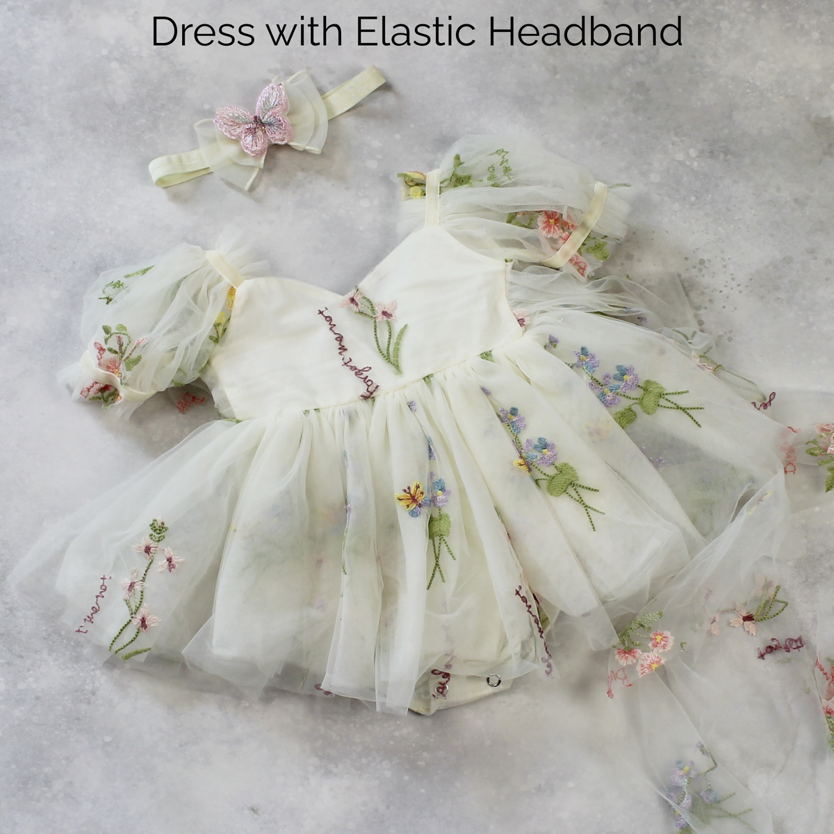 Fairy First birthday baby girls romper dress in ivory floral with wings. 