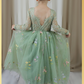 Sage floral flower girl dress in embroidered tulle. featuring long lace sleeves and full length floral tulle dress. 